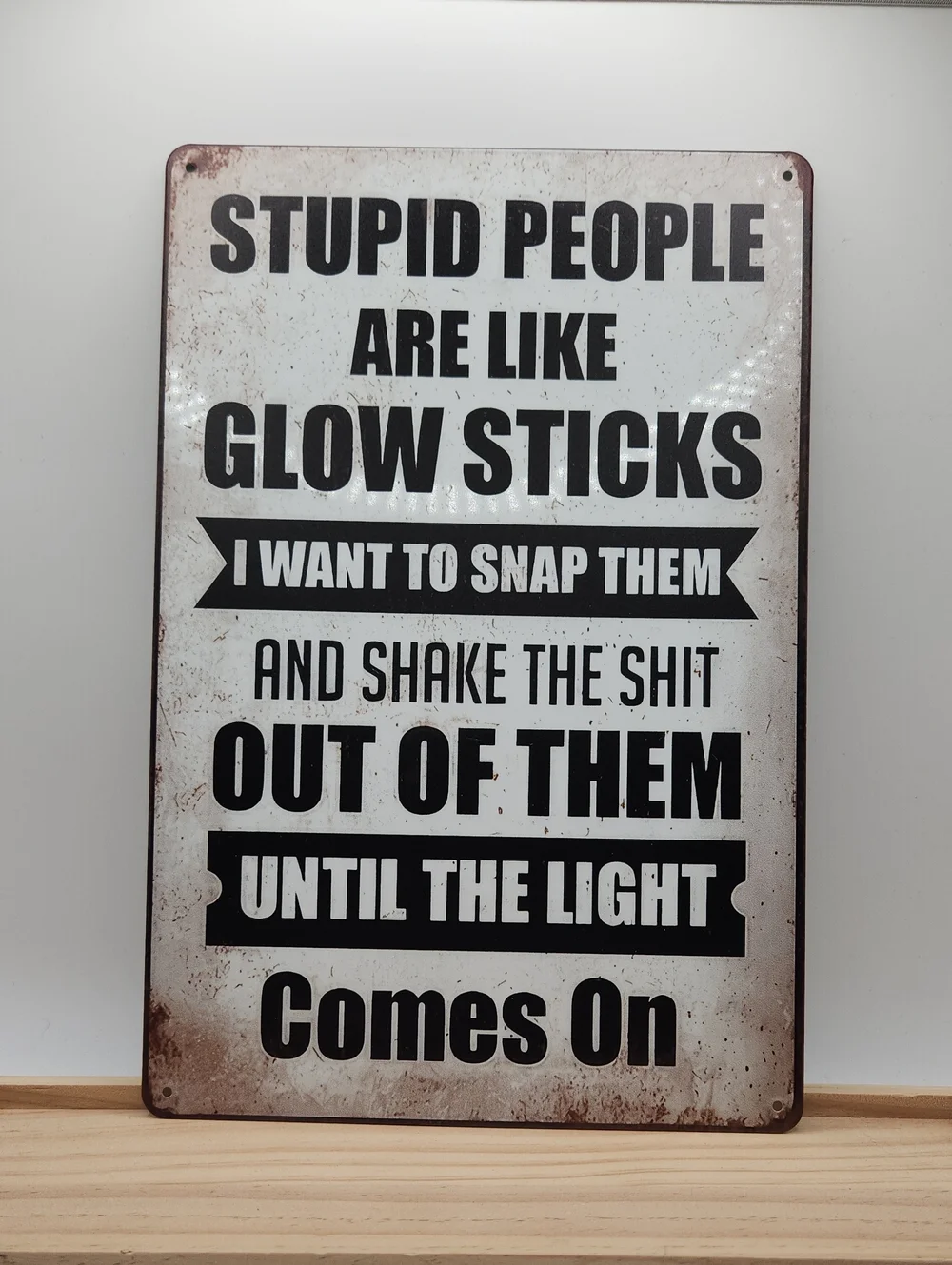 Humorous Glow Sticks Metal Wall Sign Stupid People Sarcastic Decor 7.75